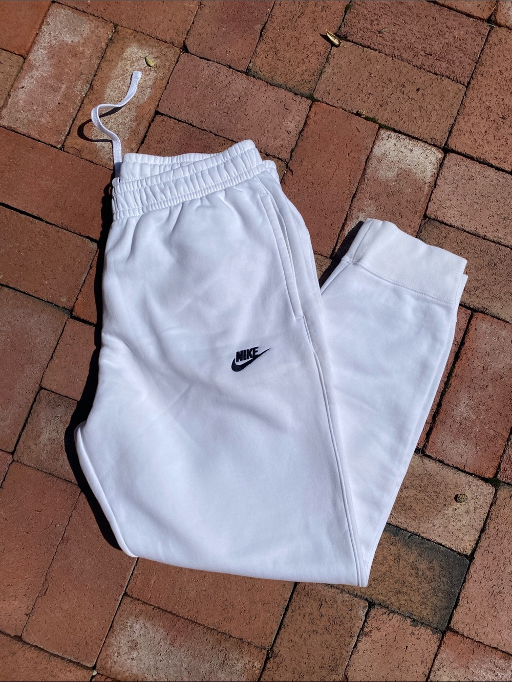 Nike White Kids Jogger Sweatpants with Black Swoosh